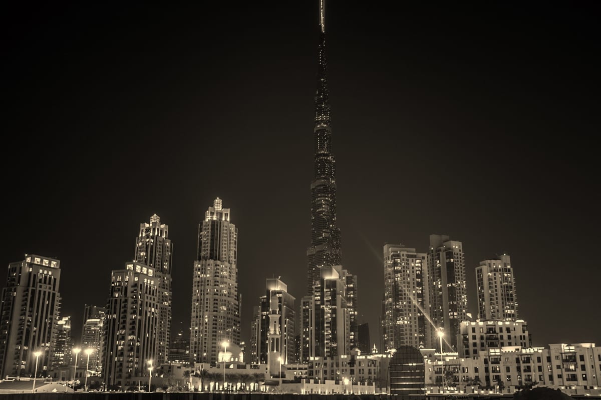 Dubai skyline at night illustrating urban normalcy amid regional travel risk monitoring
