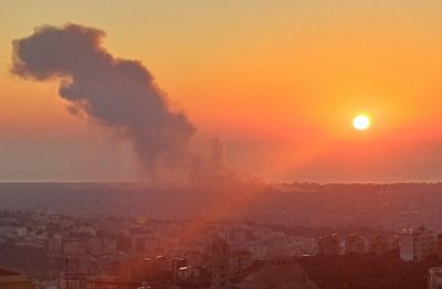Smoke over Beirut after reported strikes in March 2026