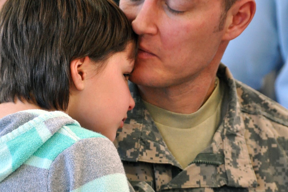Wisconsin National Guard soldiers at a formal sendoff ceremony at Camp Williams before deploying to the Middle East amid the Iran war