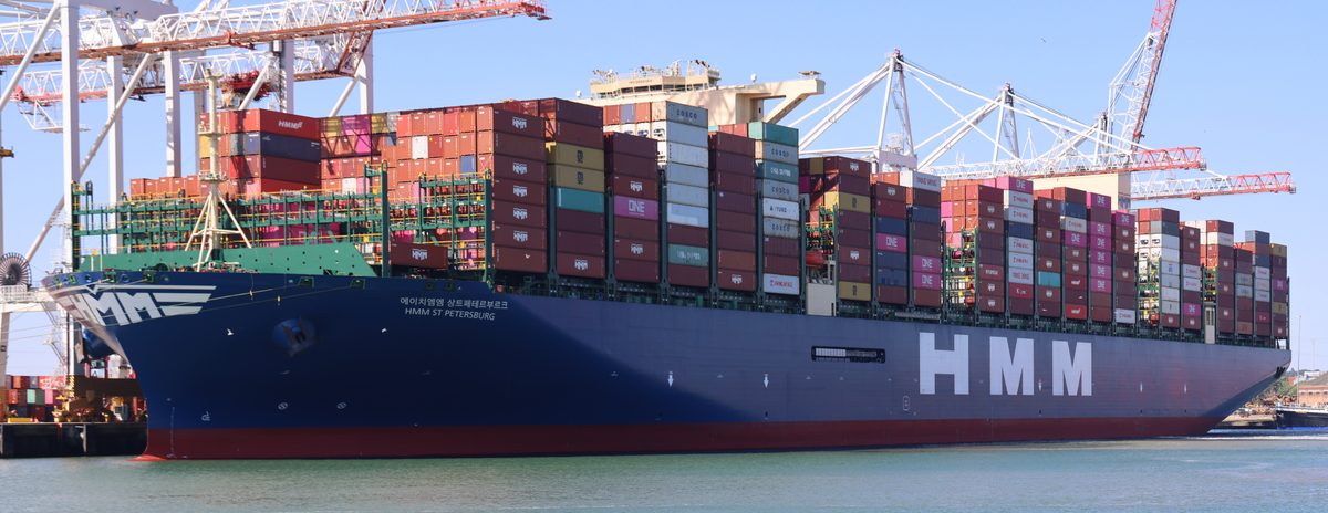 Container terminal scene used to explain war risk surcharge shipping price jumps